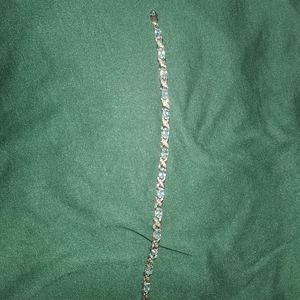Sterling silver xo bracelet with cz aquamarine stones